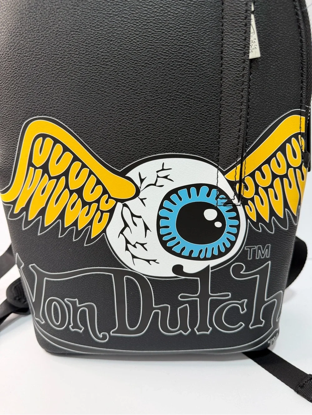 Von Dutch Black Backpack with Yellow Winged Eyeball and Blue Iris